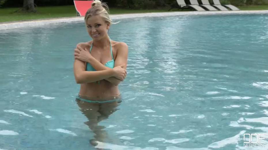 Leggy blond cutie in sexy blue bikini shows off her hot body outdoors - 6. pic
