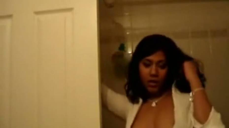 Dark skinned office whore strips on camera in some passionate way - 8. pic