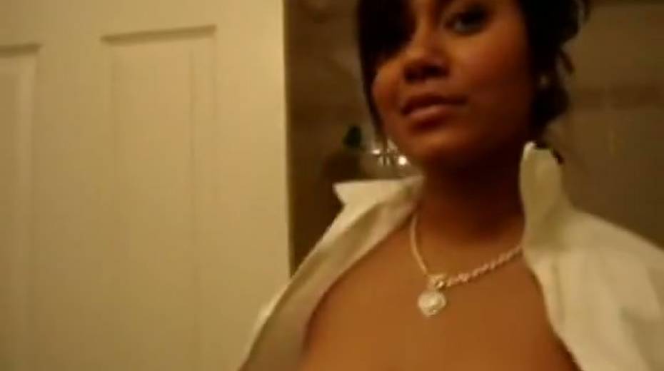 Dark skinned office whore strips on camera in some passionate way - 14. pic