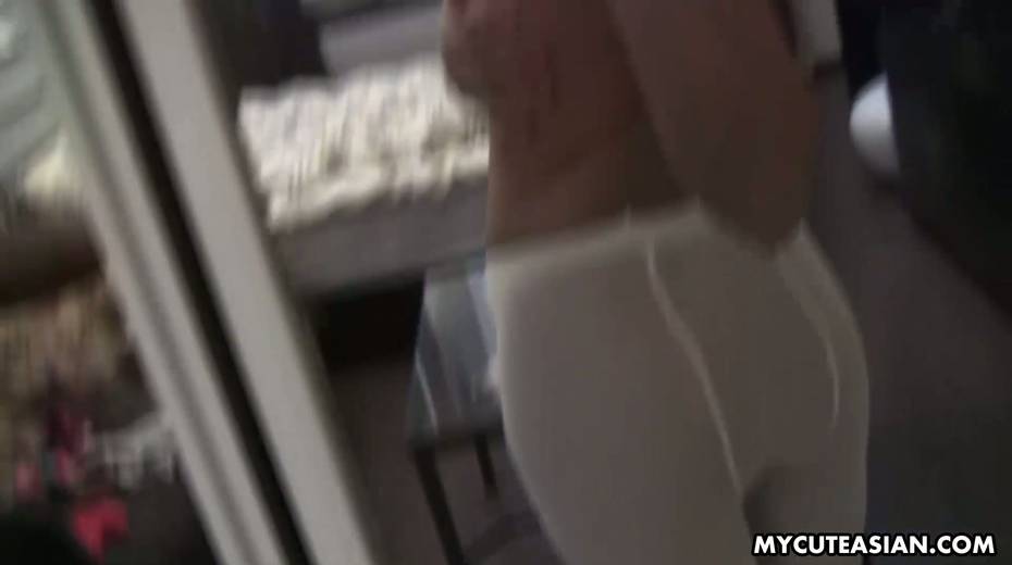 Nice Asian chick takes off white pantyhose and fucks herself - 2. pic