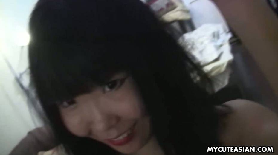 Nice Asian chick takes off white pantyhose and fucks herself - 4. pic