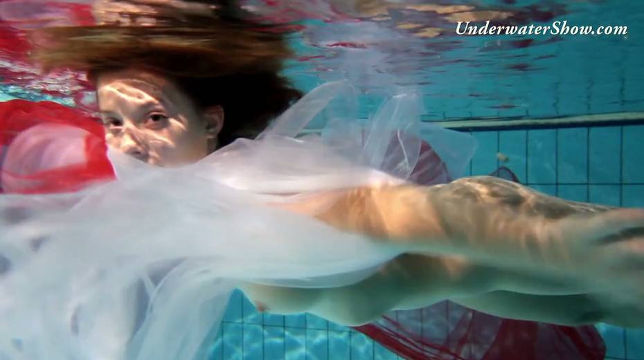 Breath taking underwater show featuring sexy babe in dress - 15. pic