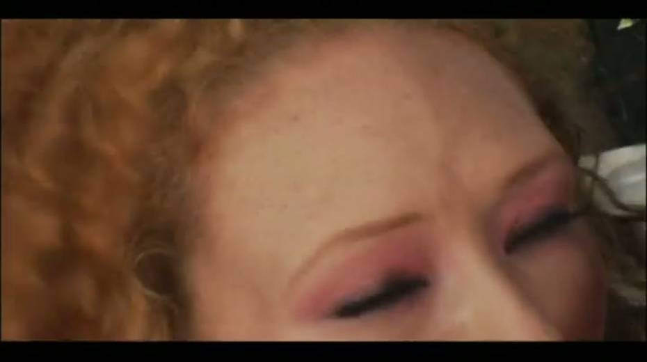This curly haired floozy is getting fucked senseless by two cocks at once - 7. pic
