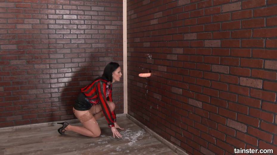 Clothed bitch with big tits gets messy in the glory hole room - 18. pic