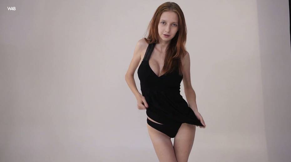 Petite red head with big fake boobies Helga Grey takes off her black dress - 6. pic