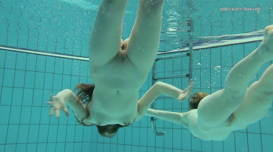 Two swimming babes undress under the water and do tricks - 24. pic