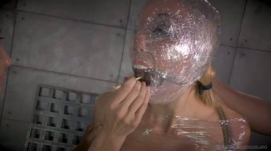 Chick in plastic wrap gets punished in the torture room - 2. pic