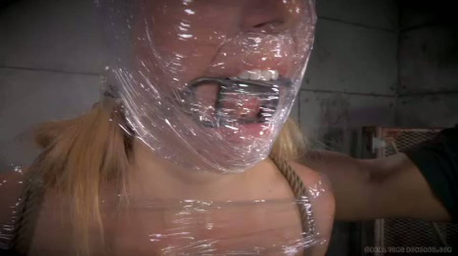 Chick in plastic wrap gets punished in the torture room - 3. pic