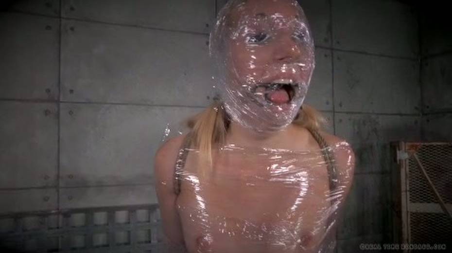 Chick in plastic wrap gets punished in the torture room - 4. pic