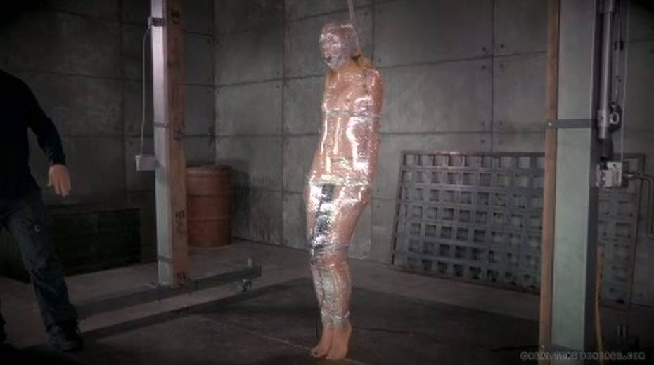Chick in plastic wrap gets punished in the torture room - 10. pic