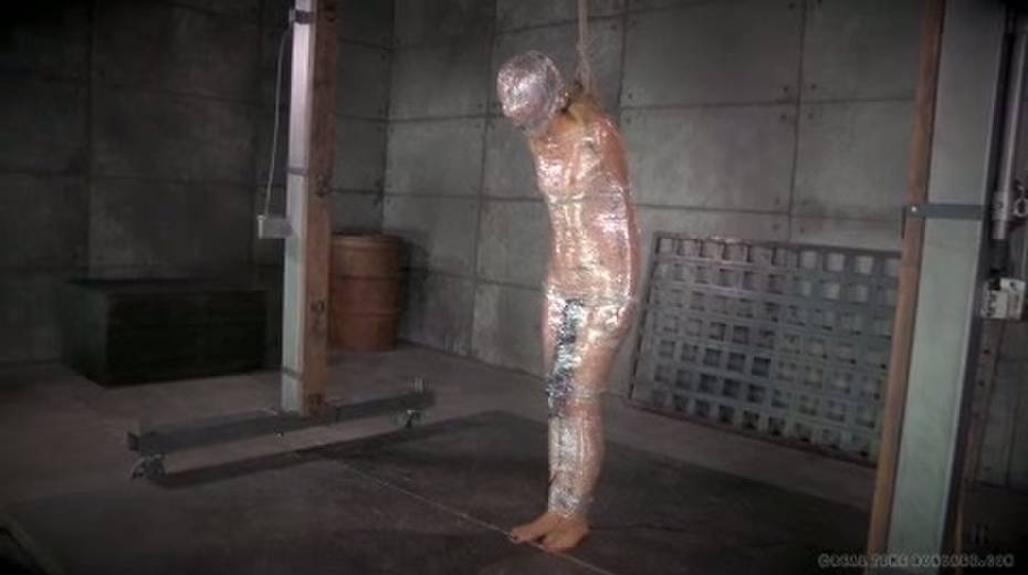 Chick in plastic wrap gets punished in the torture room - 13. pic