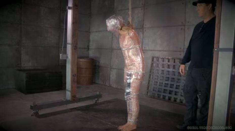 Chick in plastic wrap gets punished in the torture room - 14. pic