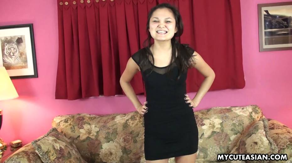 Cute Asian gal takes off dress and shows small ninnies - 9. pic