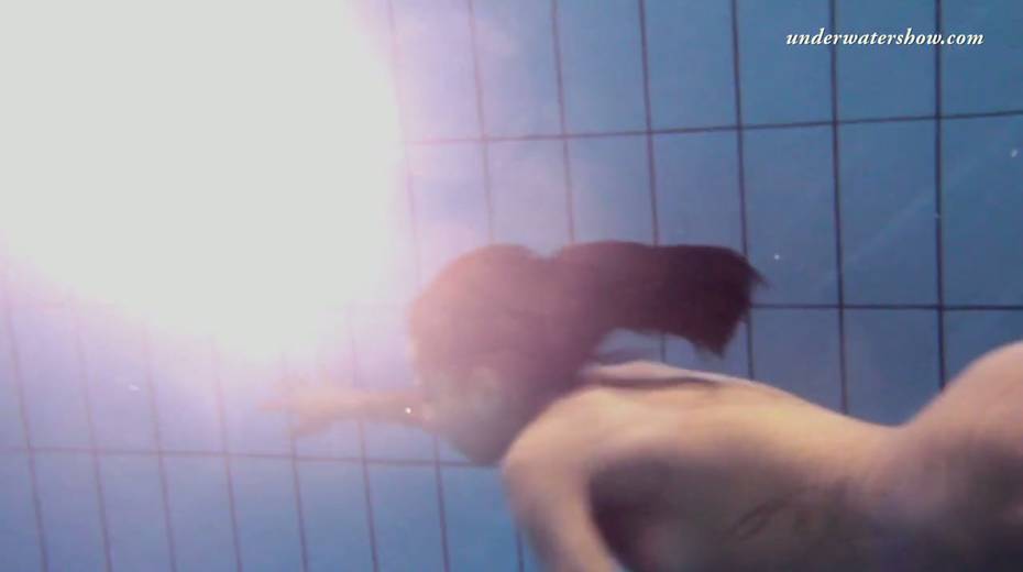 Charming teen Zlata Oduvanchik is stripping under the water - 16. pic