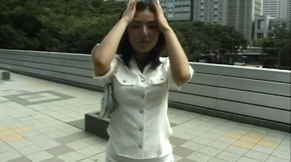 Attractive Japanese girl flashes her tits otudoor - 14. pic