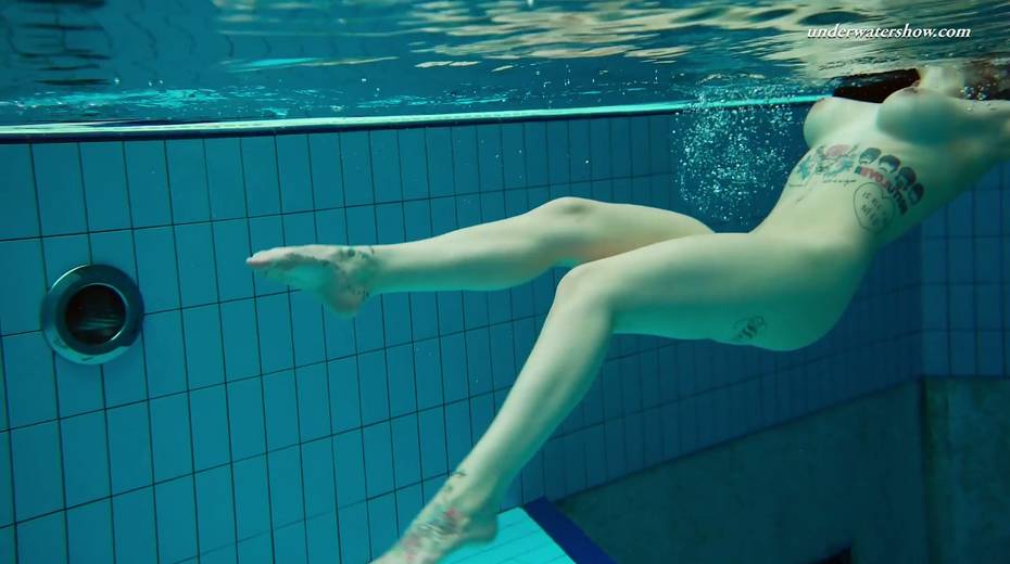 Attractive babe Dashka shows striptease under the water - 4. pic