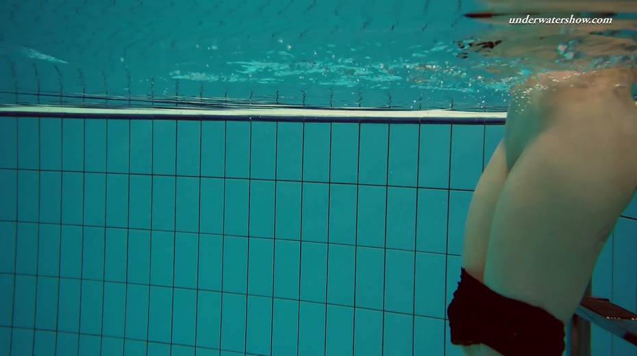 Attractive babe Dashka shows striptease under the water - 9. pic