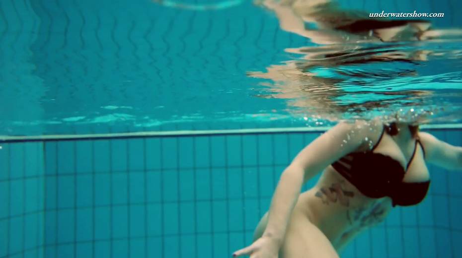 Attractive babe Dashka shows striptease under the water - 12. pic