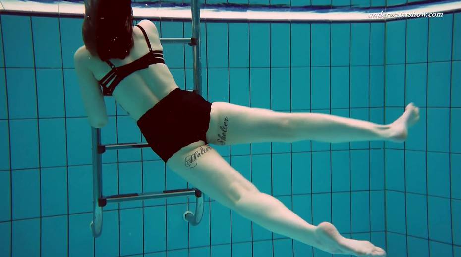 Attractive babe Dashka shows striptease under the water - 13. pic