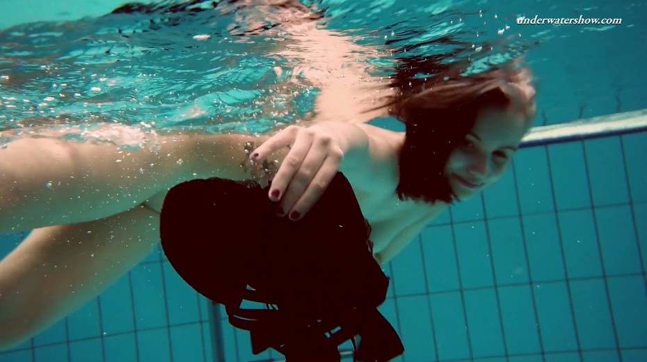 Attractive babe Dashka shows striptease under the water - 17. pic