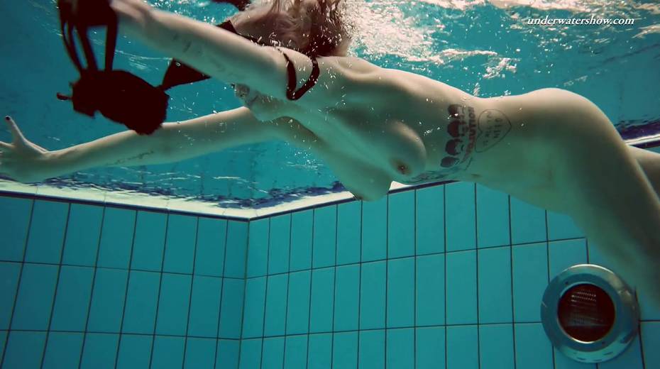 Attractive babe Dashka shows striptease under the water - 18. pic