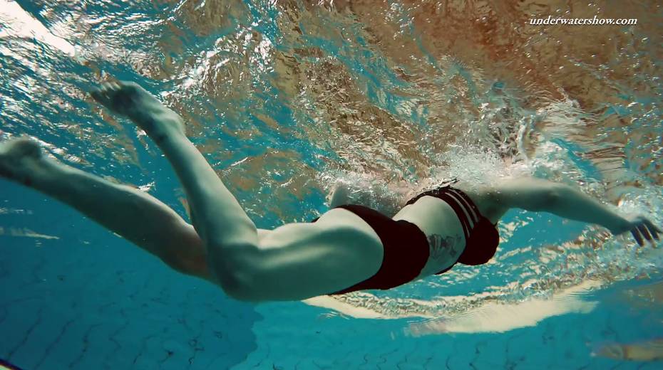 Attractive babe Dashka shows striptease under the water - 21. pic