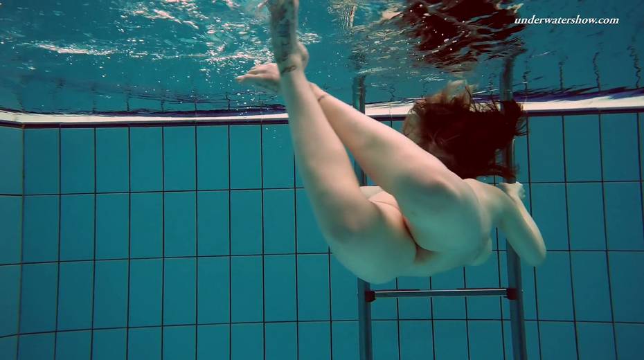 Attractive babe Dashka shows striptease under the water - 23. pic