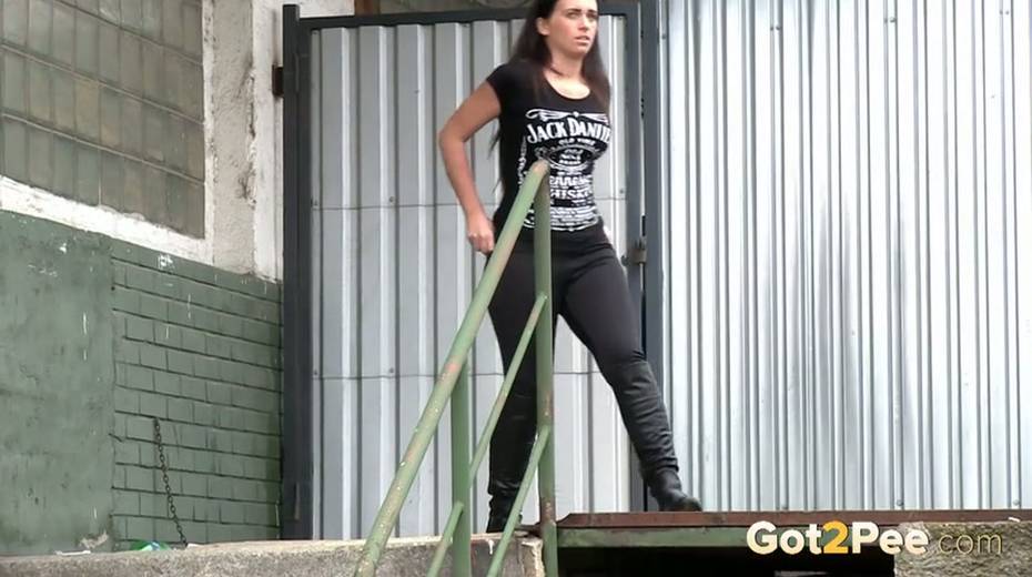 Slim black haired bitch loves pissing outdoors - 5. pic