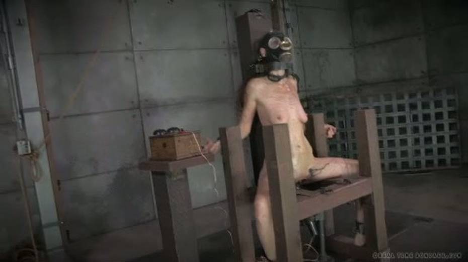 Horny mistress ties her slave to a chair and puts a gas mask on her - 6. pic