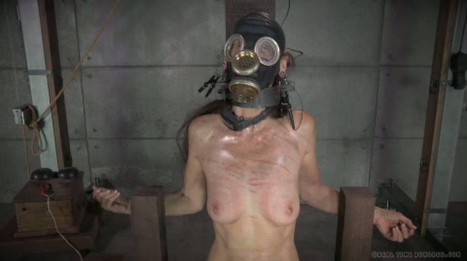 Horny mistress ties her slave to a chair and puts a gas mask on her - 12. pic