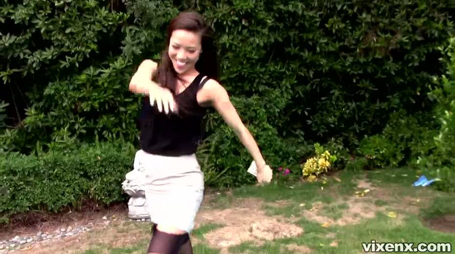 Sexy bosomy Asian brunette gal in black stockings masturbates outdoors - 8. pic