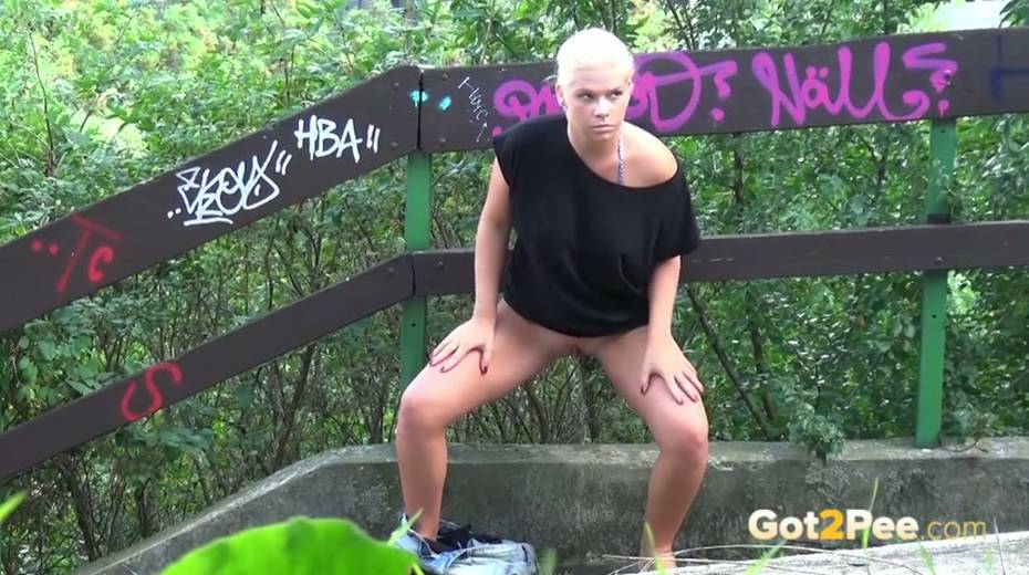 Whorish blond haired girlie pisses outdoors with pleasure - 5. pic