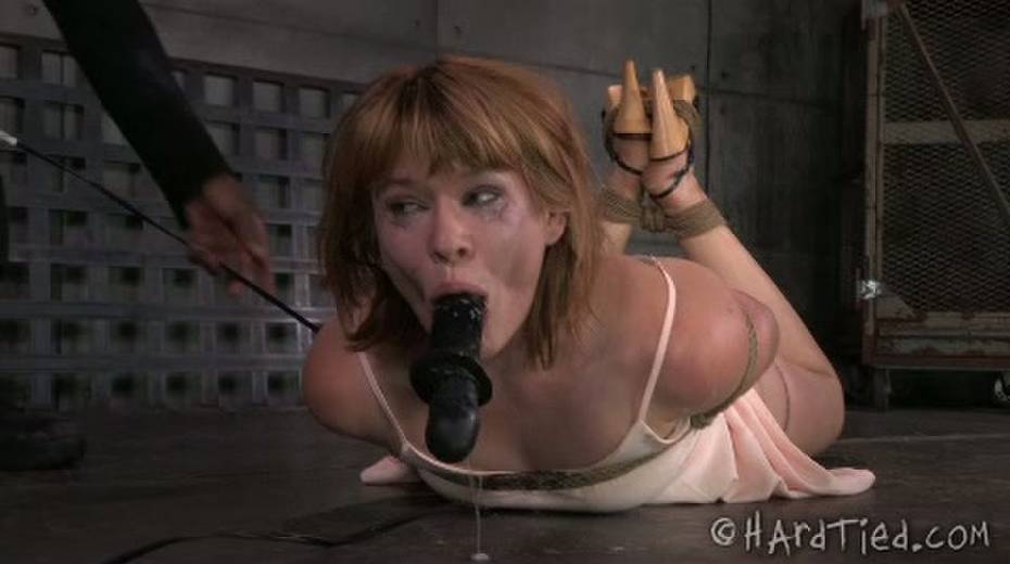 BBC dildo fucks mouth of tied up naughty red head - 15. pic