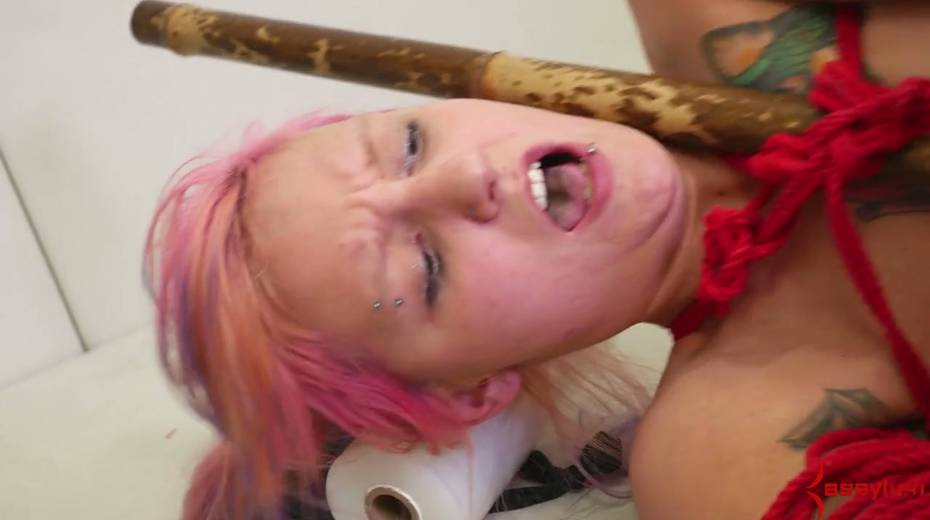 Tied up and suspended upside down model gets her mouth and anus rammed - 28. pic