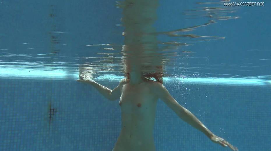 Yummy babe Irina Russaka is stripping under the water - 11. pic