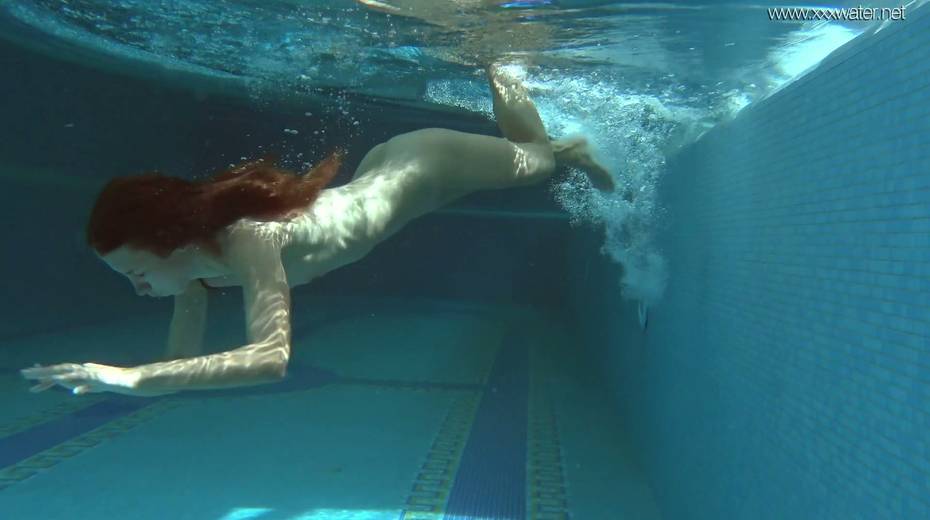 Yummy babe Irina Russaka is stripping under the water - 16. pic
