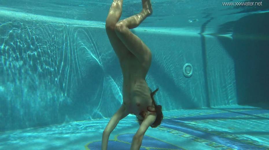 Yummy babe Irina Russaka is stripping under the water - 17. pic