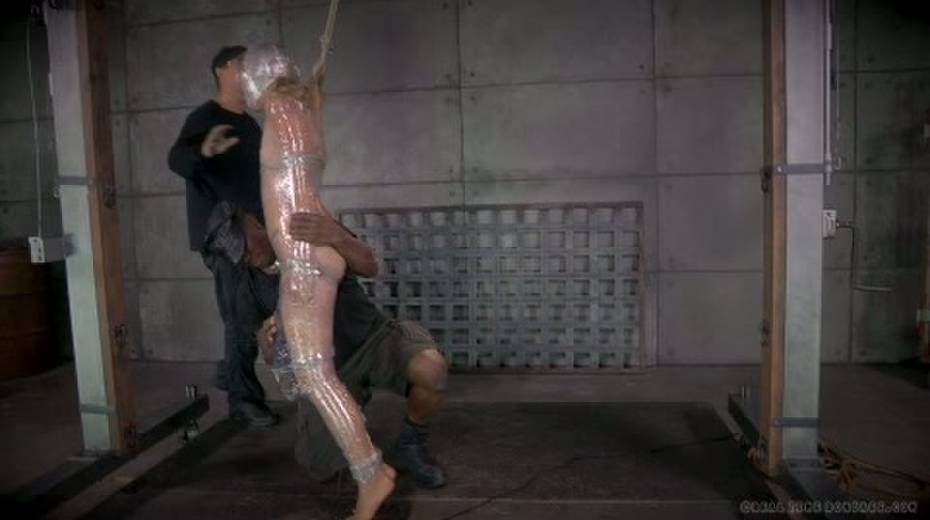 Chick in plastic wrap is punished with big black sex toy - 4. pic
