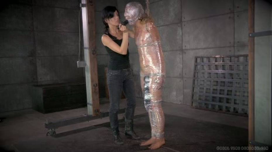 Chick in plastic wrap is punished with big black sex toy - 10. pic