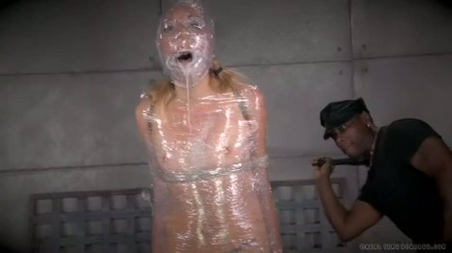 Chick in plastic wrap is punished with big black sex toy - 14. pic
