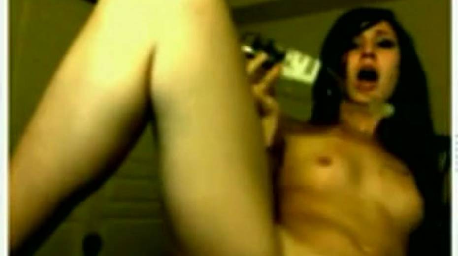 Slutty and horny bitch poking her twat with a bottle glass - 3. pic