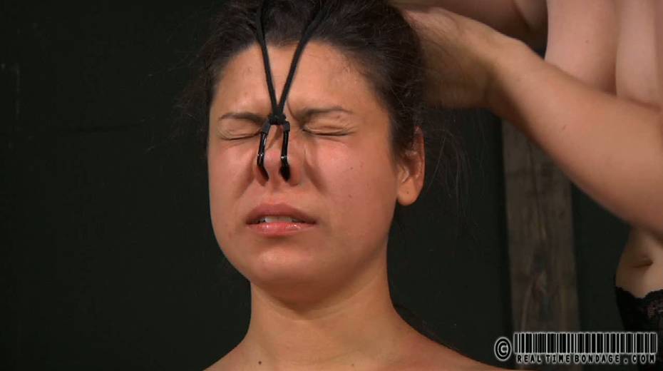 Mistress wearing only stockings punishes plum chick with nasal hooks - 12. pic
