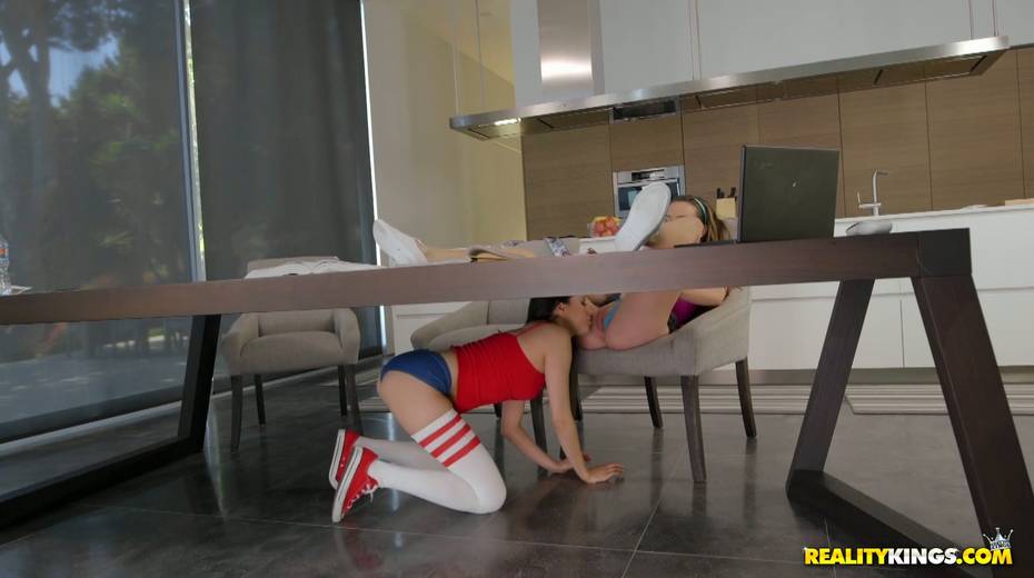Lesbian gal Shyla Jennings enjoys licking girlfriend's pussy under the table - 2. pic