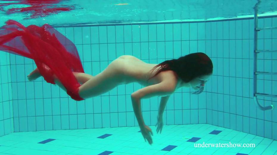 Two pretty hot babes are swimming and stripping under the water - 3. pic