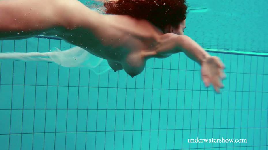 Two pretty hot babes are swimming and stripping under the water - 4. pic