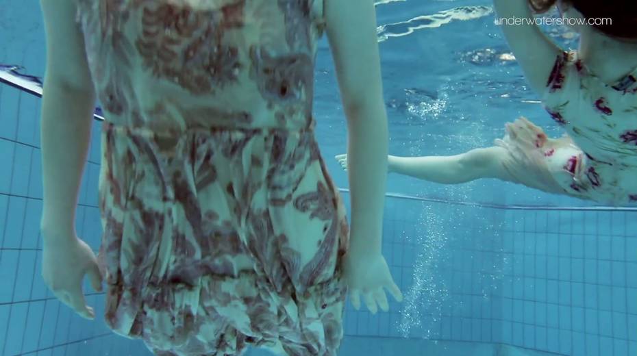Two yummy swimming babes is stripping under the water - 4. pic