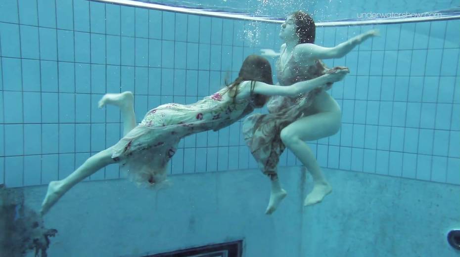 Two yummy swimming babes is stripping under the water - 6. pic