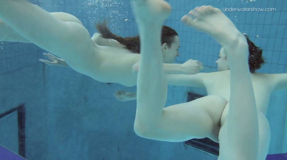 Two yummy swimming babes is stripping under the water - 14. pic