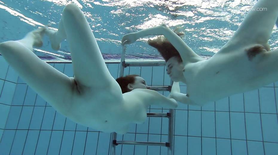 Two yummy swimming babes is stripping under the water - 23. pic