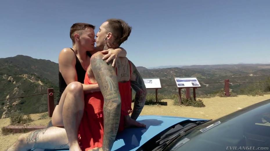 Short haired dyke Jiz Lee is fucked hard by tattooed crossdresser right on the car hood - 11. pic